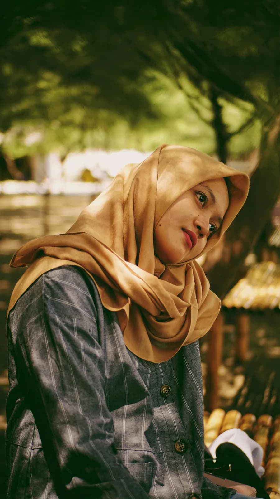 Honey gold hijab in dappled light